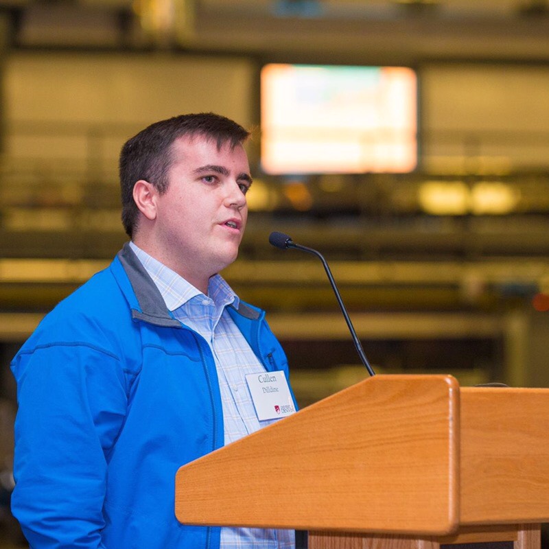 Man speaking at podium