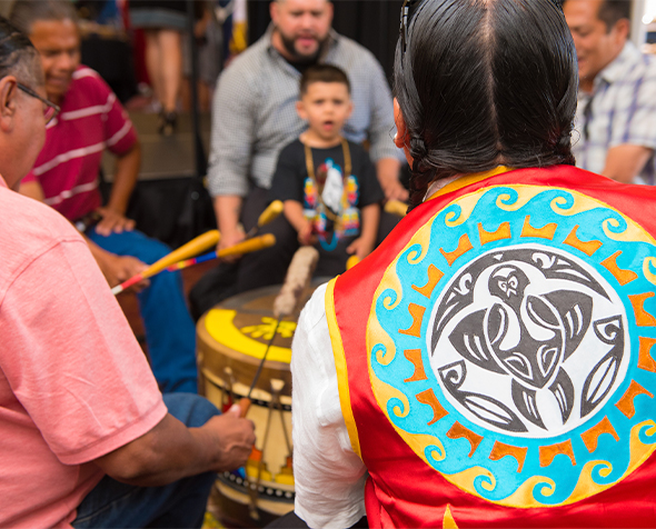 Thumbnail Image  of indigenous group playing drums