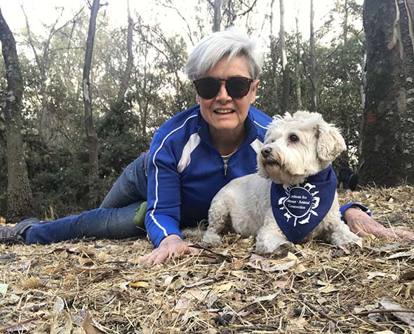 Maria with her therapy dog in nature