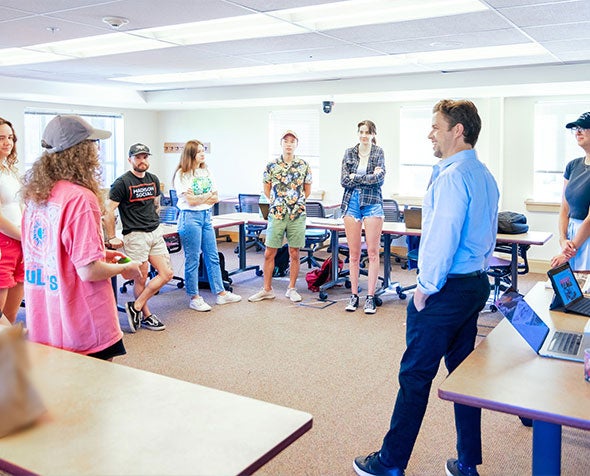 Students talking in a circle