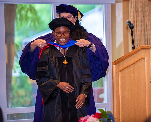 Grad Alumn Annie Zean Dunbar during the 2024 PhD Graduation Ceremony