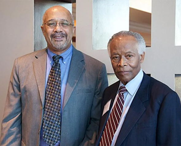 Dean Emeritus James Herbert Williams (on left) and Youlon Savage (right)