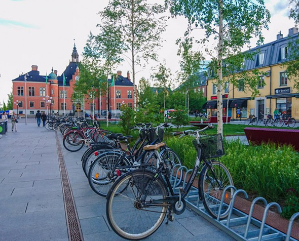cobblestone street with bikes ​