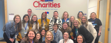 Group in front of Petsmart Charities sign