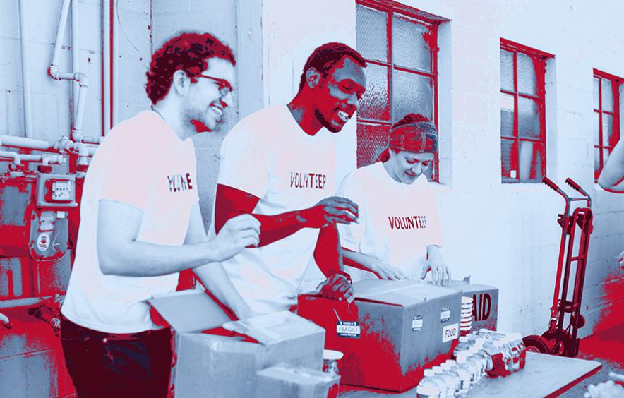 Volunteers at voting site giving out waters