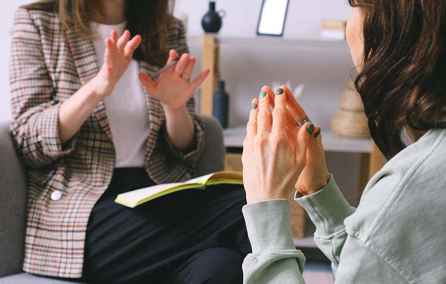 two people in a therapy setting