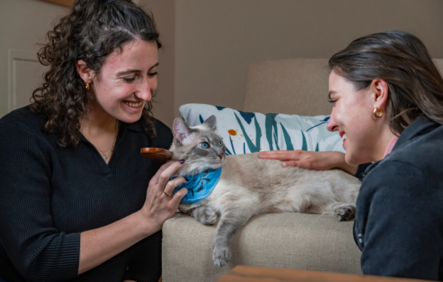 Two women with therapy cat