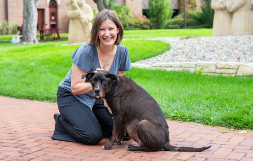 IHAC researcher Jaci Gandenberger with pet dog Sophie