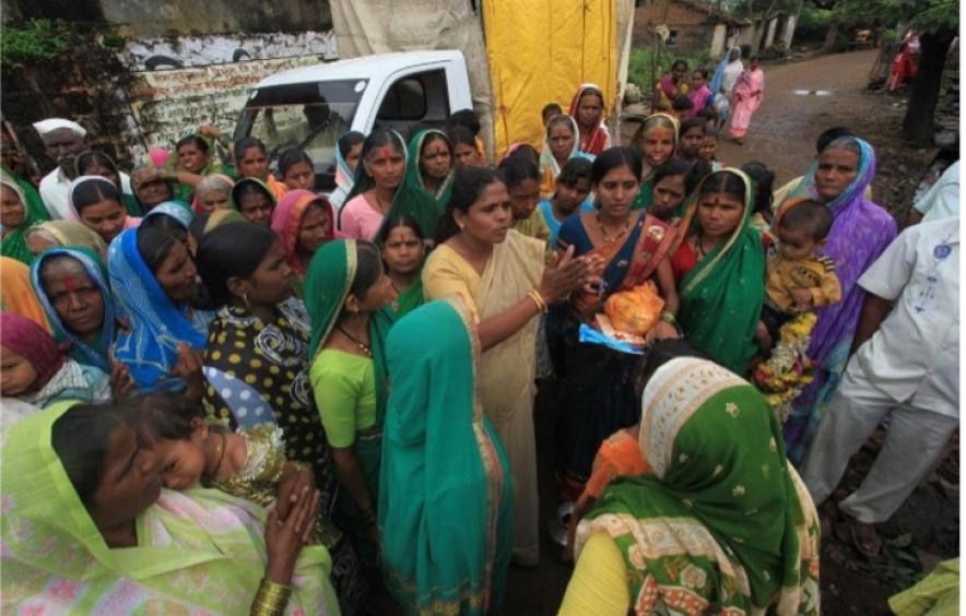 Indian residents meeting together outside