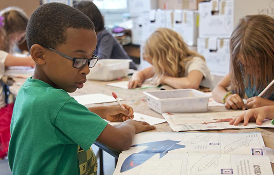 A boy doing school work