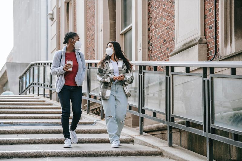 Two girls walking together