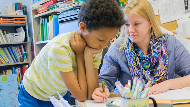 teacher with student