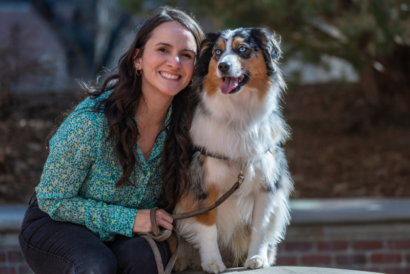 Smiling and happy woman with pet dog