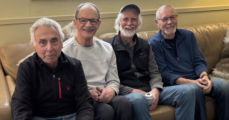 GSSW Professors Emeriti Walter LaMendola, William Cloud, Jeff Jenson, and Jim Moran gather to watch a recent Denver Broncos football game.