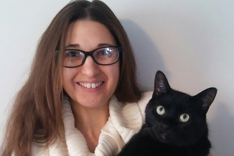 Portrait of Kim Korona with her black cat