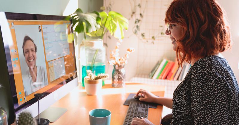 woman in front of a computer on a call