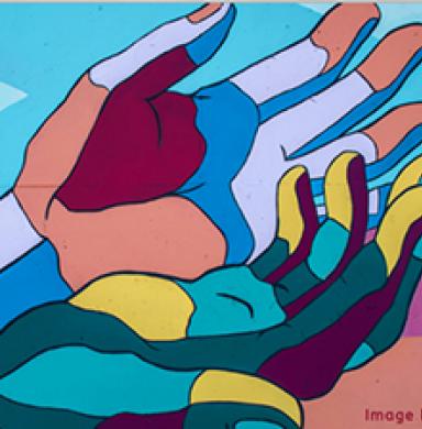 A mural with multi colored hands