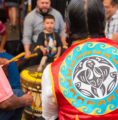 Snippet image of indigenous group playing drums