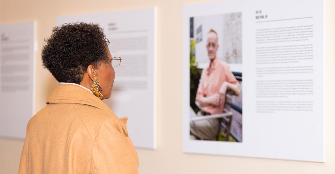 A person observing a display poster