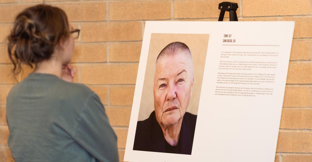 A person observing a display poster