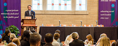 person speaking to audience